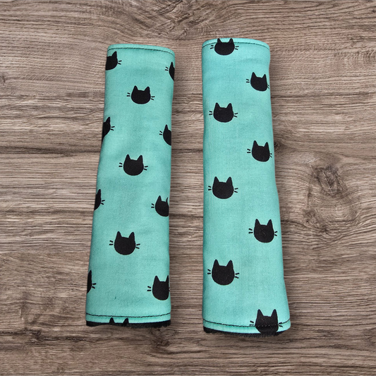 Black cat seatbelt covers (reversable)