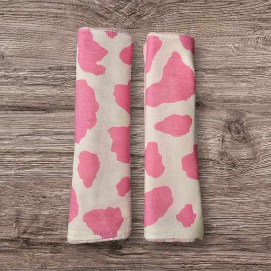 Pink Cow Print Seatbelt covers reversable